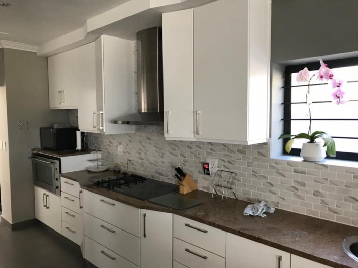 White kitchen cupboards with dark tops White Kitchen Cupboards
